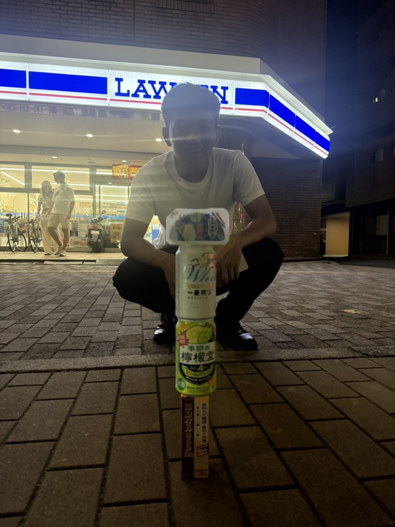 Late-night stop at a neighborhood Lawson convenience store