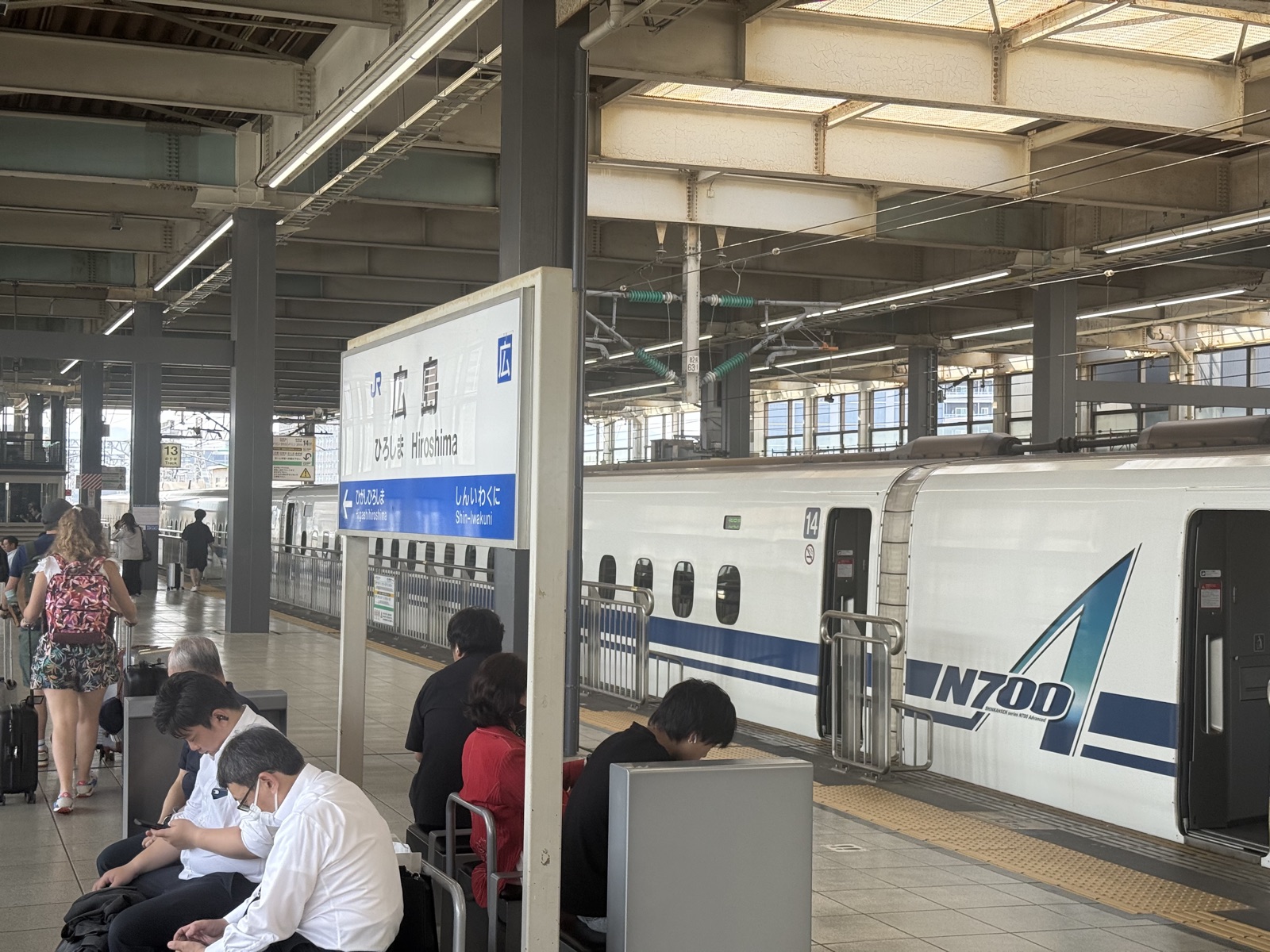 Boarding an N700 Shinkansen at the station platform