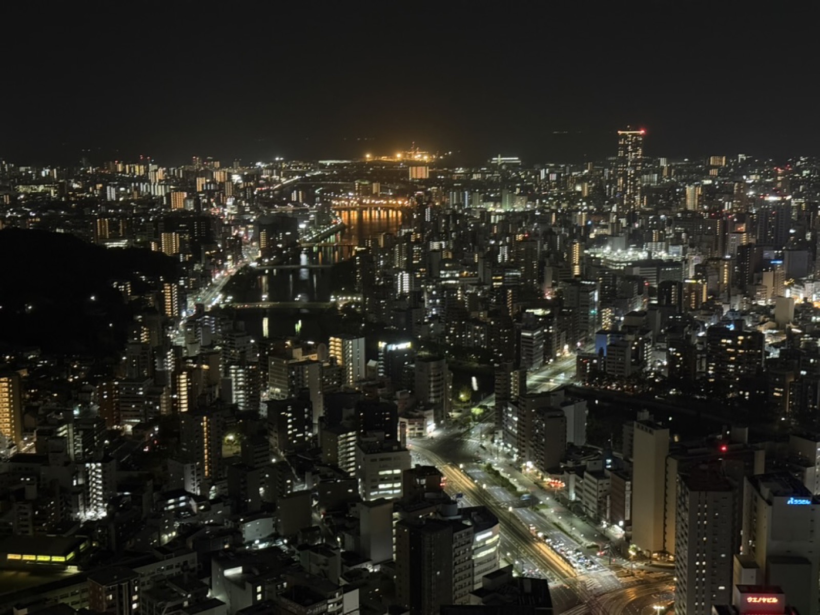 Hiroshima city skyline at night with lit streets and rivers