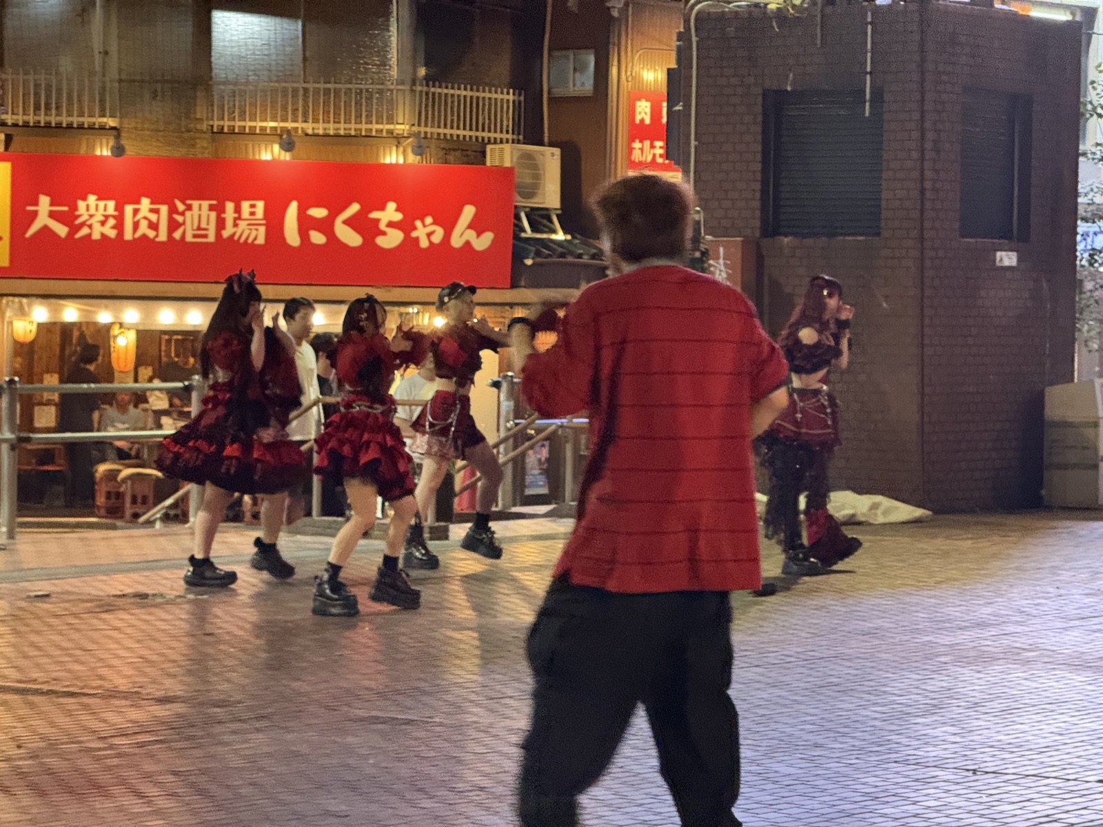 Izakaya storefront offering grilled meat dining in Hiroshima