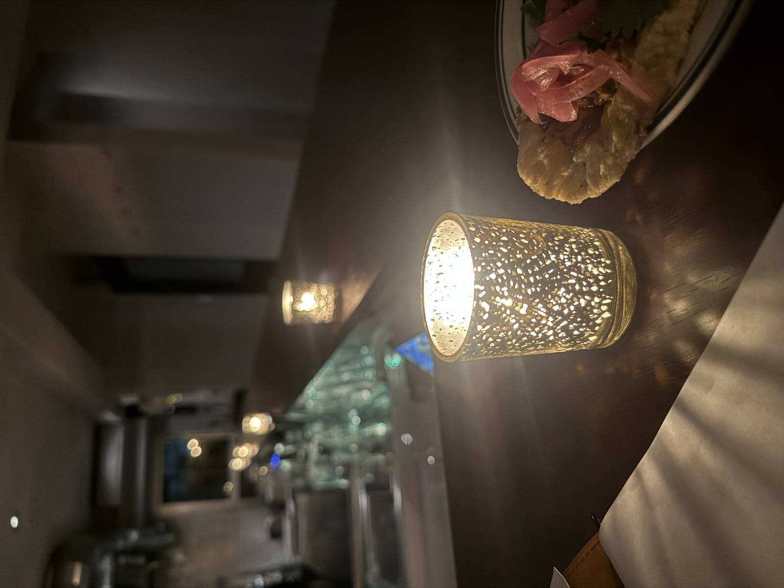 Candlelight on the counter at VUELTA