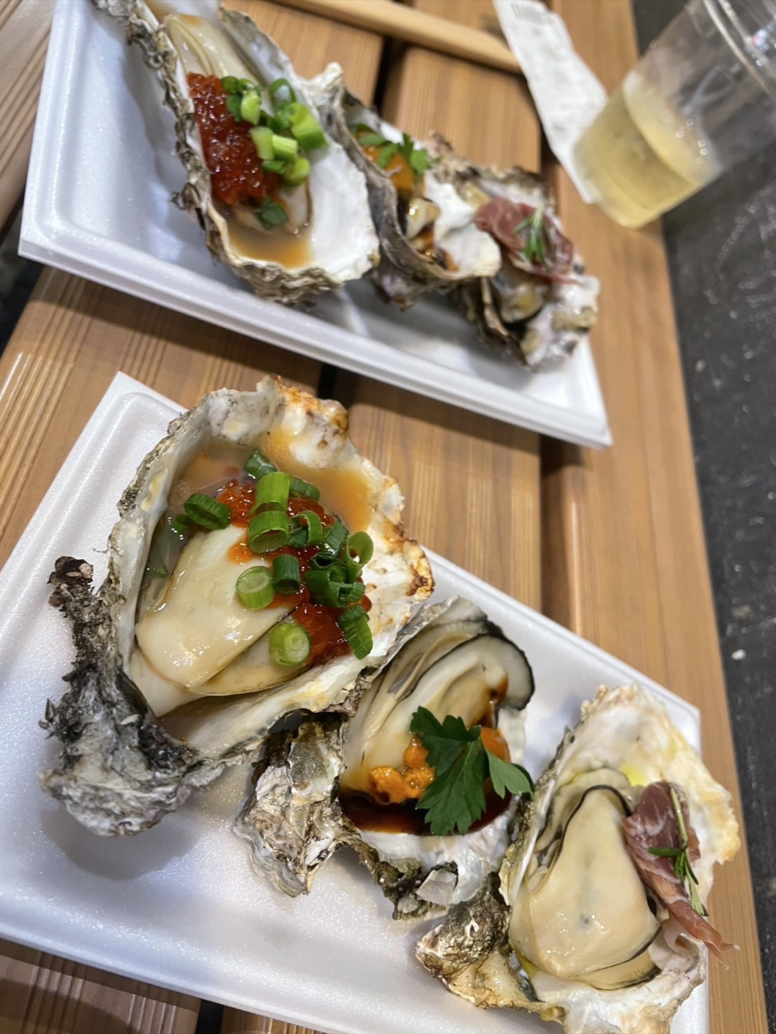 Hiroshima oyster plate with tobiko and green onion topping
